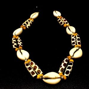 Real Cawry she’ll and antique bone necklace